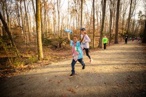 Kids On The Move teams run the Twilight One Miler